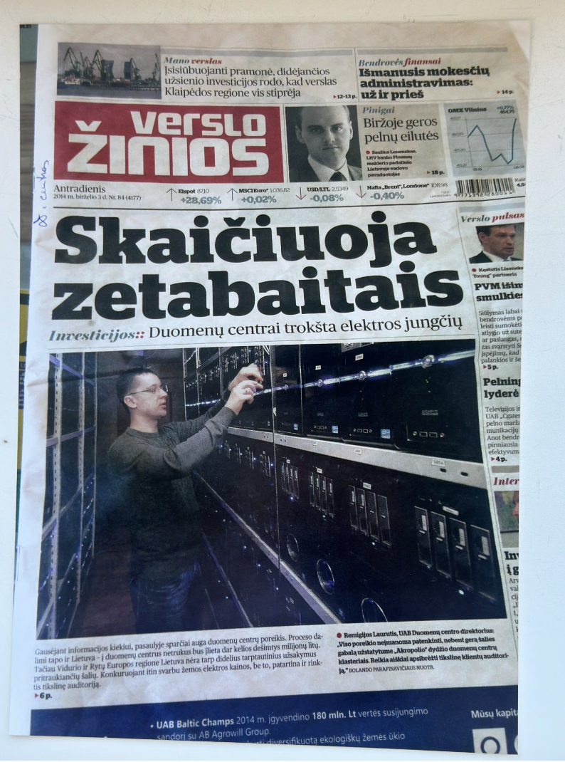 Cherry Servers employees at a conference in a booth